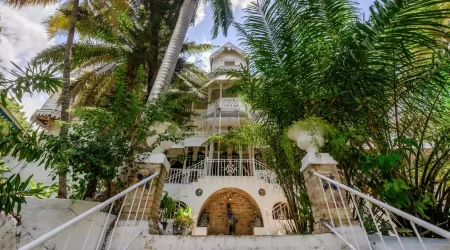 Hotel Oloffson: Haiti’s Iconic Haven of History, Mystery, and Art, Now Reduced to Ashes (With Creole Translation)